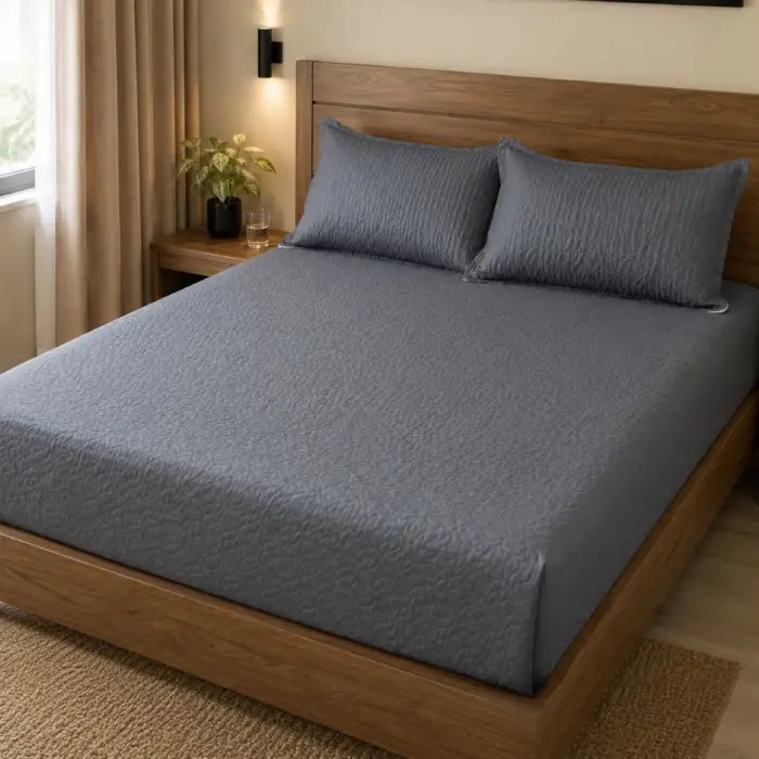 edredon gris ajustable tipo cubrecordon